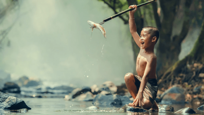 Do Not Despise the Day of Small Things - (Image: Small boy catches a small fish by spearfishing)
