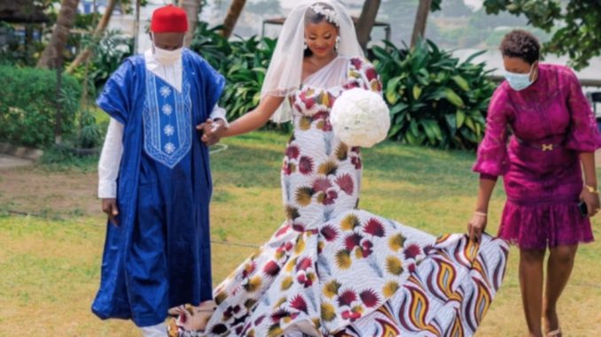 Nigerian fashion designer satisfies her desire, wears an Ankara gown on her wedding day - 9News Nigeria