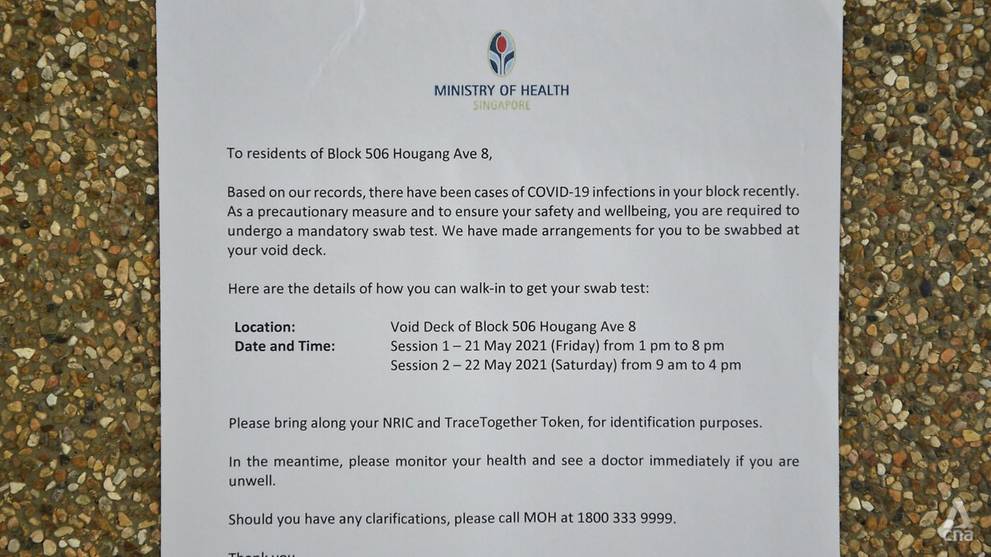 An MOH notice pasted at the void deck of Block 506 Hougang Avenue 8 on May 21, 2021. (Photo- Jeremy Long)