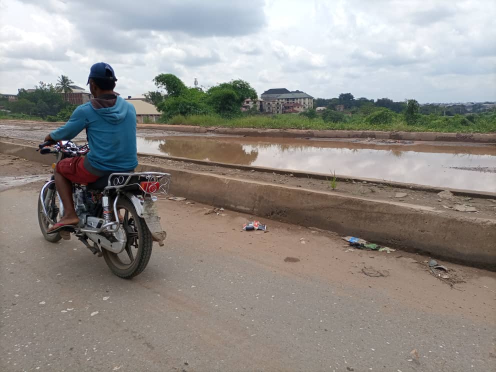 IMO PEOPLE BEMOAN CONTINUED NEGLIGENCE OF BAD SPOTS ALONG OWERRIABA ROAD AND OTHERS