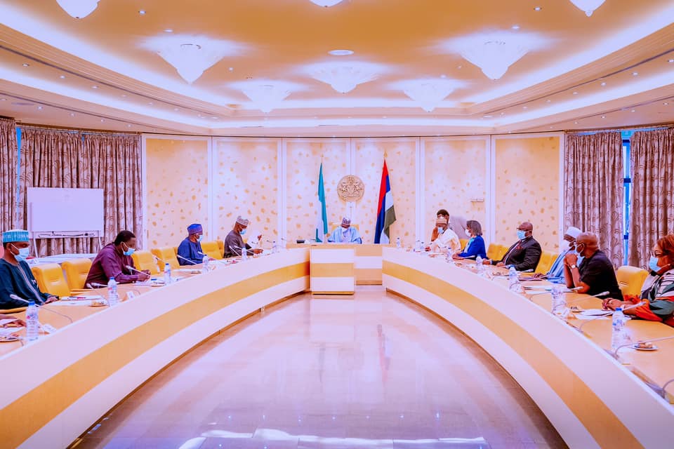 President Buhari receives briefing from Chairman and Members of Independent National Electoral Commission (INEC) in State House on 1st June 2021