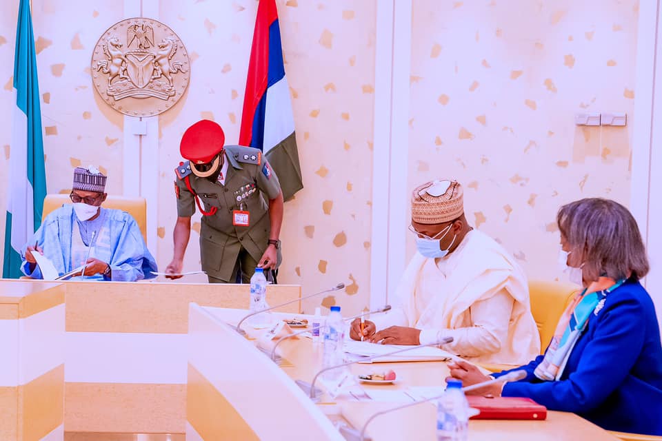 President Buhari receives briefing from Chairman and Members of Independent National Electoral Commission (INEC) in State House on 1st June 2021