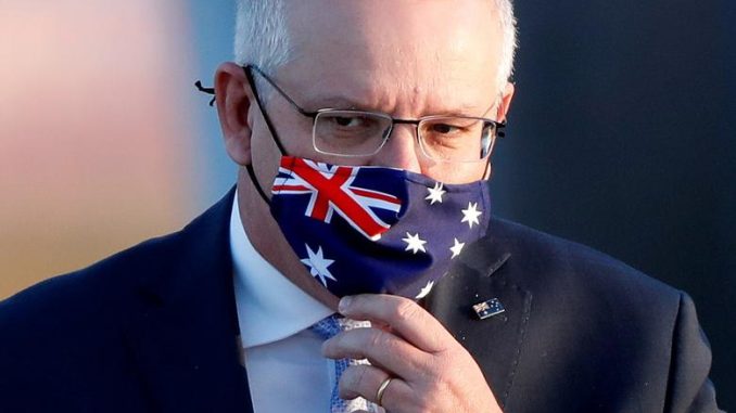 Australian Prime Minister Scott Morrison wearing Australian Flag Mask