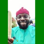 Comrade Princely Onyenwe and Nigerian Flag