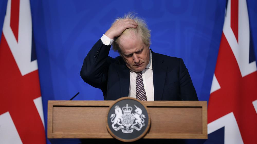 embattled boris johnson faces mps after tory revolt against covid 19 measures