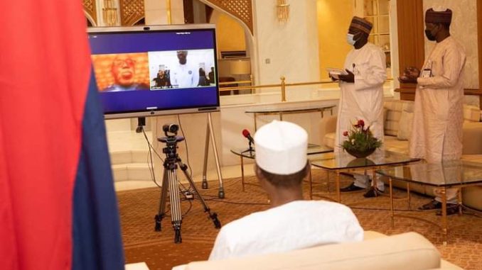 President Buhari Makes video call to Eagles before their game with Tunisia