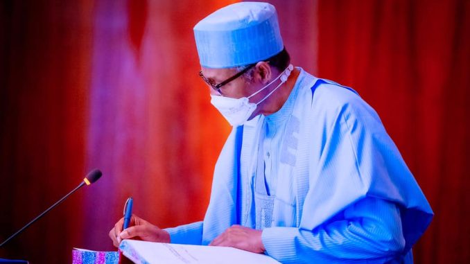 President Muhammadu Buhari Signs Document for appointment of new executive members