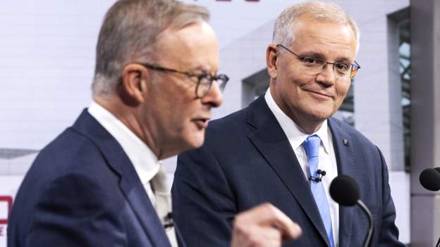 Scott Morrison (right) is hoping to win a second term as Australia's PM