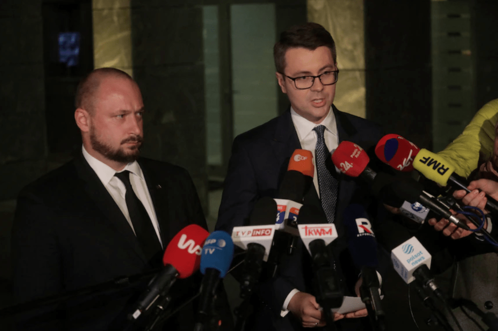 Polish Government spokesman Piotr Muller addressing media