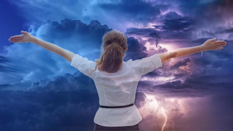 Woman Praising God In The Midst of Storm