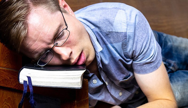 Tired Man with Bible - The word of God