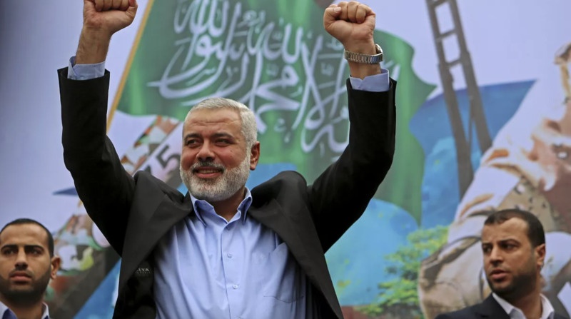 Ismail Haniyeh greets supporters during a rally. Picture: AP.