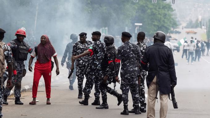 Nigerian security detain a demonstrator, during a protest against bad governance and economic hardship in Abuja, Nigeria August 1, 2024. REUTERS/Marvellous Durowaiye