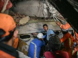 Rescue teams work to save residents trapped under the rubble of the destroyed Sky Villa Condominium ThailandMyanmarQuake 8 1
