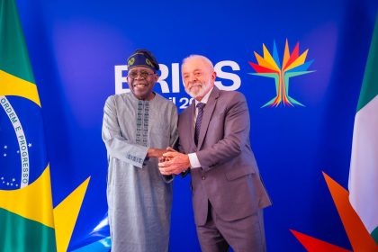 President Bola Tinubu in a handshake with President Luiz Inacio Lula da Silva of Brazil scaled 1