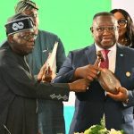 President Bola Tinubu officially handing over the chairmanship of the ECOWAS to President Julius Maada Bio of Sierra Leone 1024x630 3